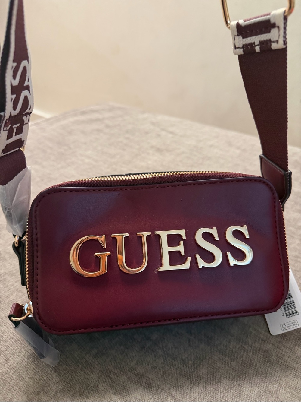 GUESS Burgundy and Gold Logo Crossbody Bag